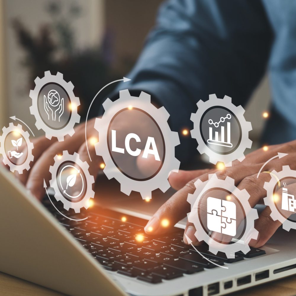 LCA, Life cycle assessment concept. Busines using a computer to ISO LCA standard aims to limit climate change. Methodology for assessing environmental impacts associated on value chain product. Carbon footprint evaluation.